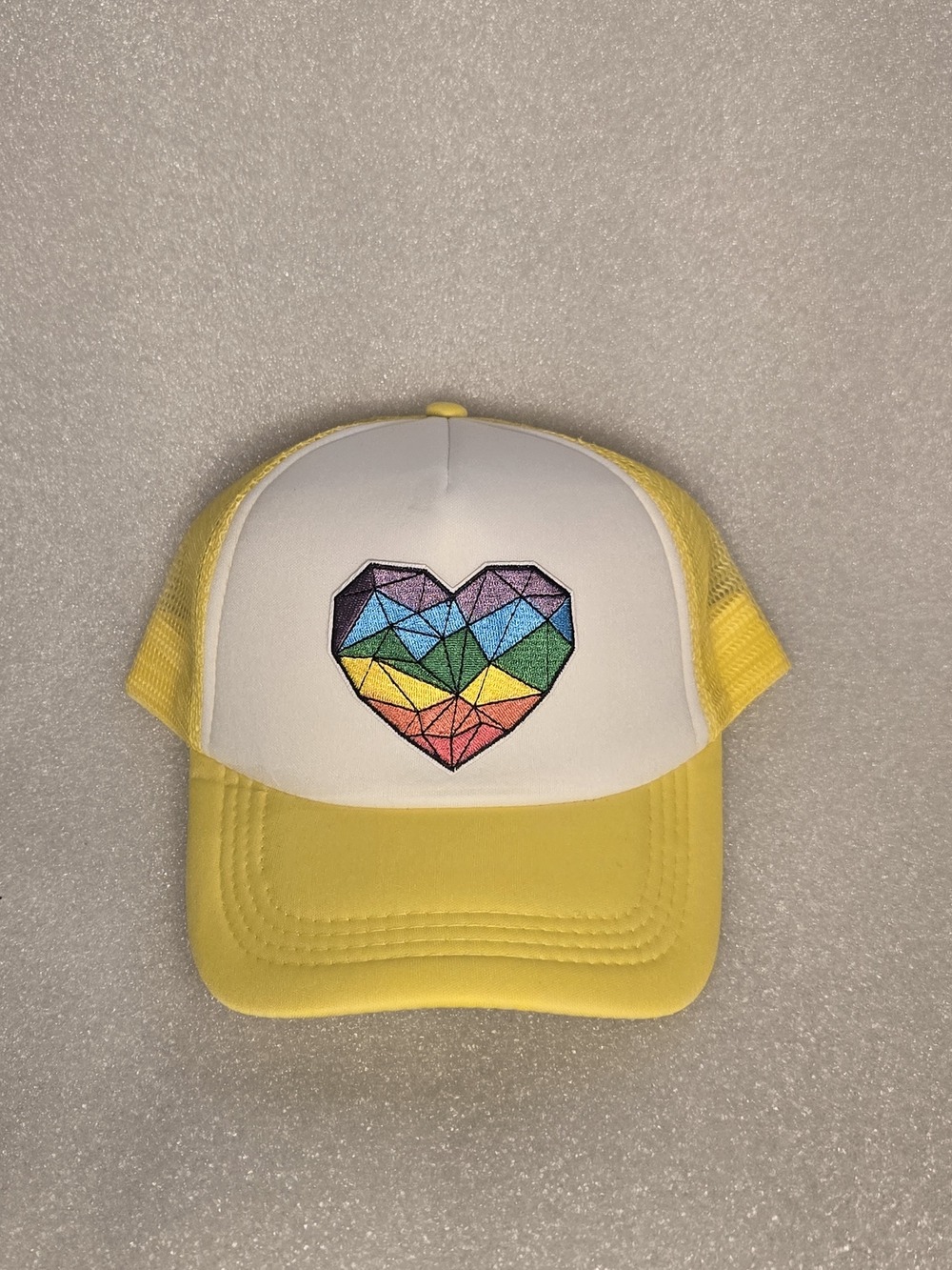 Yellow Trucker Cap with Geo Rainbow Heart